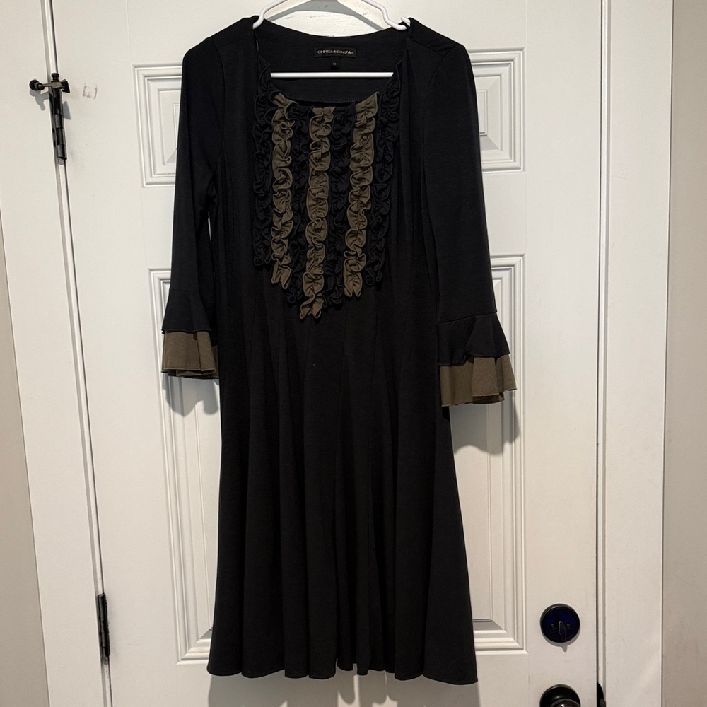 Chic Black Dress with Tan Ruffle Accents